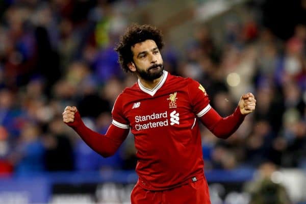 Liverpool's Mohamed Salah celebrates scoring his side's third goal of the game during the Premier League match at the John Smith's Stadium, Huddersfield. (Martin Rickett/PA Wire.)