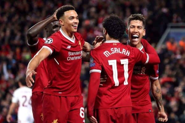 Liverpool's Roberto Firmino (right) celebrates scoring his side's fourth goal of the game with Mohamed Salah and Trent Alexander-Arnold (left) (Martin Rickett/EMPICS Sport)