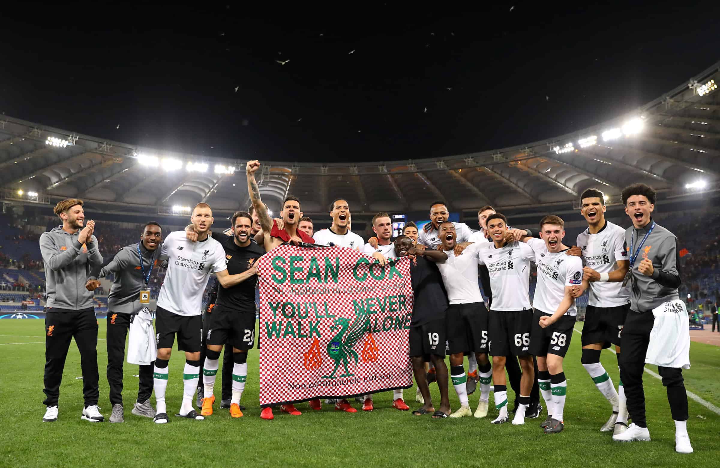 Liverpool celebrate reaching the Champions League Final, with a banner for fan Sean Cox during the UEFA Champions League, Semi Final, Second Leg at the Stadio Olimpico, Rome. PRESS ASSOCIATION Photo. Picture date: Wednesday May 2, 2018. (Photo: Steven Paston/PA Wire)