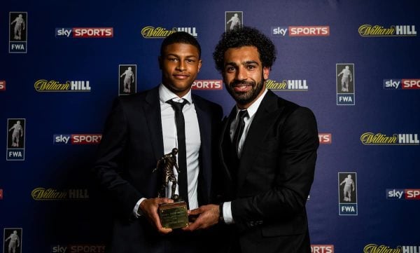 Liverpool's Mohamed Salah poses with his FWA Footballer of the Year 2018 award alongside team-mate Rhian Brewster during the FWA Footballer of the Year Dinner at The Landmark Hotel, London.