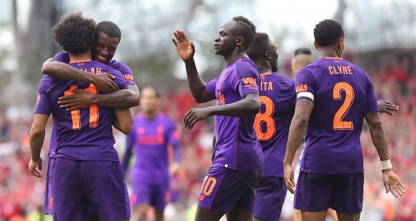 Liverpool's Mohamed Salah (left) celebrates scoring his sides third goak of the match with team mates during the pre-season friendly match at the Aviva Stadium, Dublin. ( Niall Carson/PA Wire/PA Images)