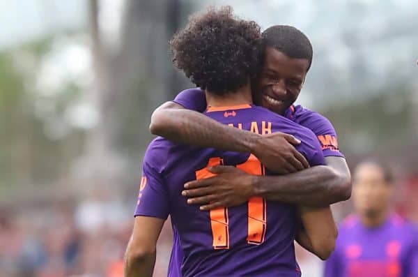 Liverpool's Mohamed Salah (left) celebrates scoring his sides third goak of the match with team mates during the pre-season friendly match at the Aviva Stadium, Dublin. ( Niall Carson/PA Wire/PA Images)