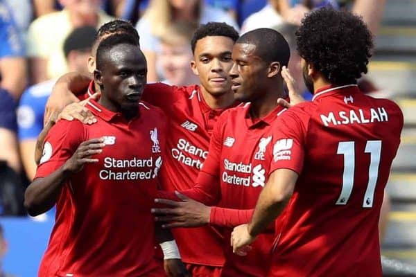 Liverpool's Sadio Mane (left) celebrates scoring his side's first goal of the game with his team-mates