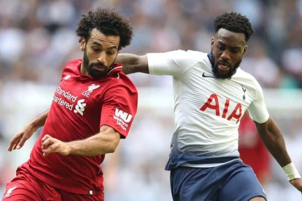 Liverpool's Mohamed Salah (left) and Tottenham Hotspur's Danny Rose battle for the ball during the Premier League match at Wembley Stadium, London.