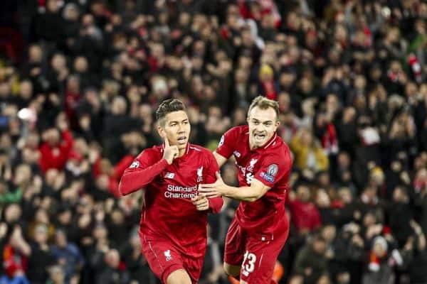 Liverpool forward Roberto Firmino (9) celebrates with Liverpool midfielder Xherdan Shaqiri (23) after scoring his goal during the Uefa Champions League Group Stage football match n.3 LIVERPOOL - CRVENA ZVEZDA on 24/10/2018 at the Anfield Road in Liverpool, England. (Photo by Matteo Bottanelli/NurPhoto/Sipa USA)