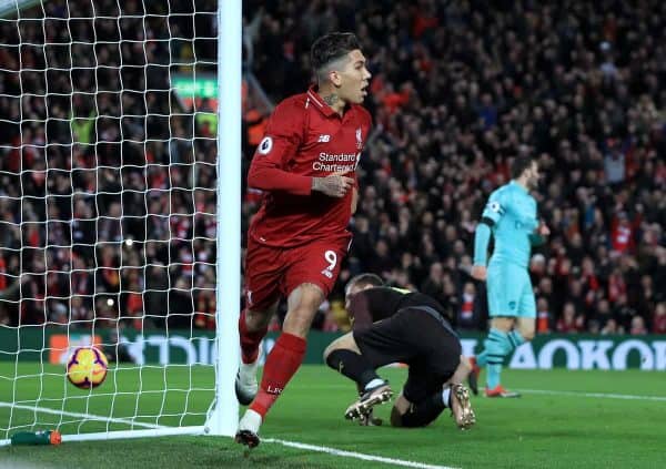 Liverpool's Roberto Firmino celebrates scoring his side's first goal of the game during the Premier League match at Anfield, Liverpool (Peter Byrne/PA Wire/PA Images)