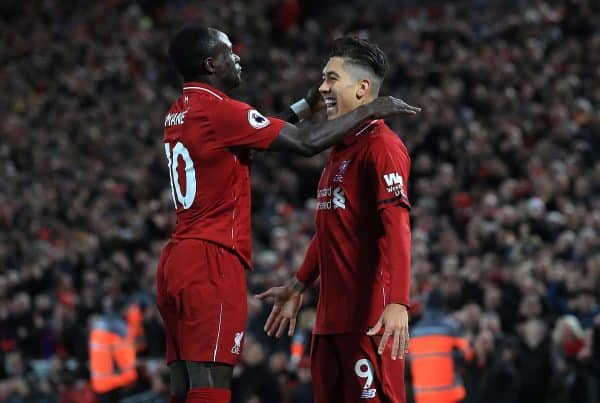 Liverpool's Roberto Firmino (right) celebrates scoring his side's first goal of the game with team-mate Sadio Mane during the Premier League match at Anfield, Liverpool (Peter Byrne/PA Wire/PA Images)