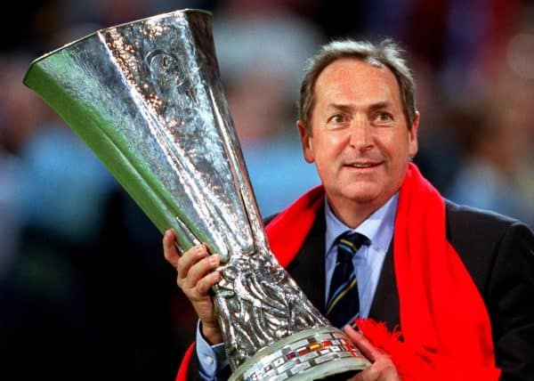 Liverpool manager Gerard Houllier proudly holds the UEFA Cup (PA Images)