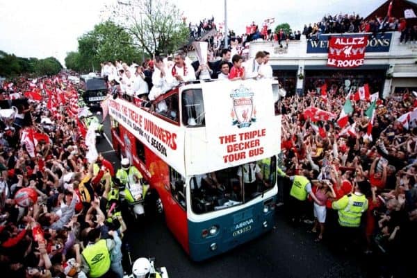 Liverpool fans line the streets as the team parade the three trophies won during season 2000-2001 season ( Matthew Ashton/EMPICS Sport)