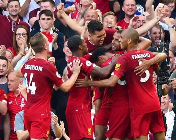 Liverpool's Joel Matip (centre) celebrates scoring his side's first goal of the game with team-mates during the Premier League match at Anfield, Liverpool. (Anthony Devlin/PA Wire/PA Images)