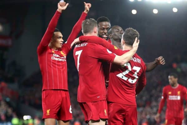 Liverpool's Xherdan Shaqiri (right) celebrates scoring his side's second goal of the game with team-mates during the Premier League match at Anfield, Liverpool.