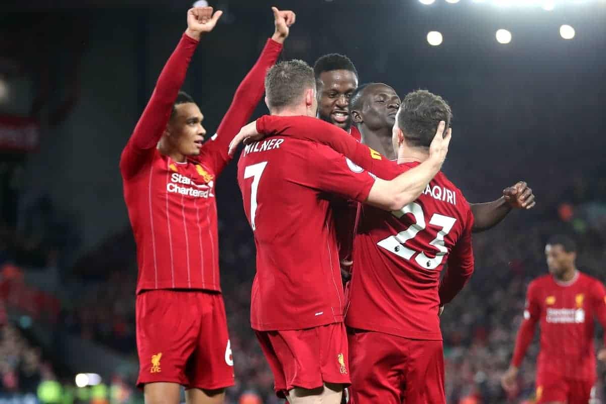 Liverpool's Xherdan Shaqiri (right) celebrates scoring his side's second goal of the game with team-mates during the Premier League match at Anfield, Liverpool.
