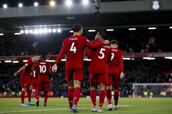 Georginio Wijnaldum (r) of Liverpool celebrates with Virgil Van Dijk after scoring his teams fifth goal of the game during the Premier League match at Anfield, Liverpool. Picture date: 4th December 2019. Picture credit should read: James Wilson/Sportimage via PA Images