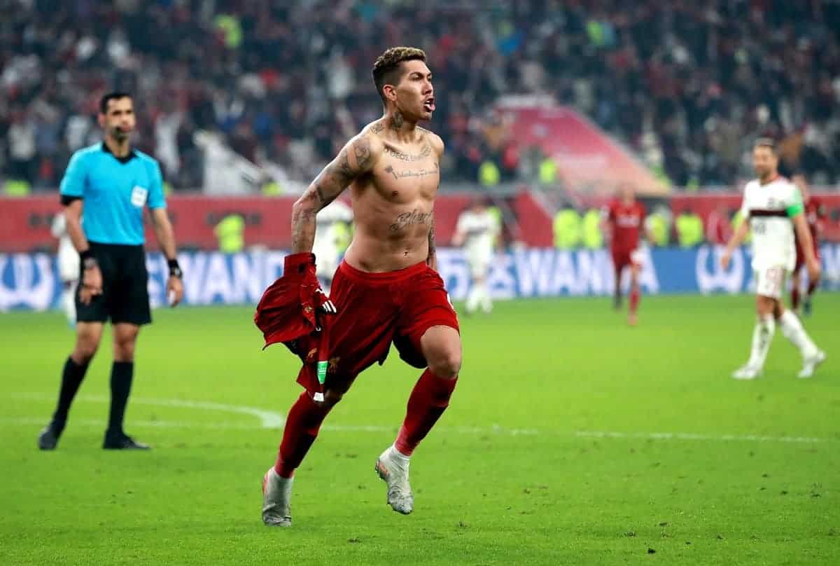 Liverpool's Roberto Firmino celebrates scoring his side's first goal of the game during the FIFA Club World Cup final at the Khalifa International Stadium, Doha. PA Photo. Picture date: Saturday December 21, 2019. See PA story SOCCER Liverpool. Photo credit should read: Adam Davy/PA Wire. RESTRICTIONS: Editorial use only. No commercial use. No use with any unofficial 3rd party logos. No manipulation of images. No video emulation