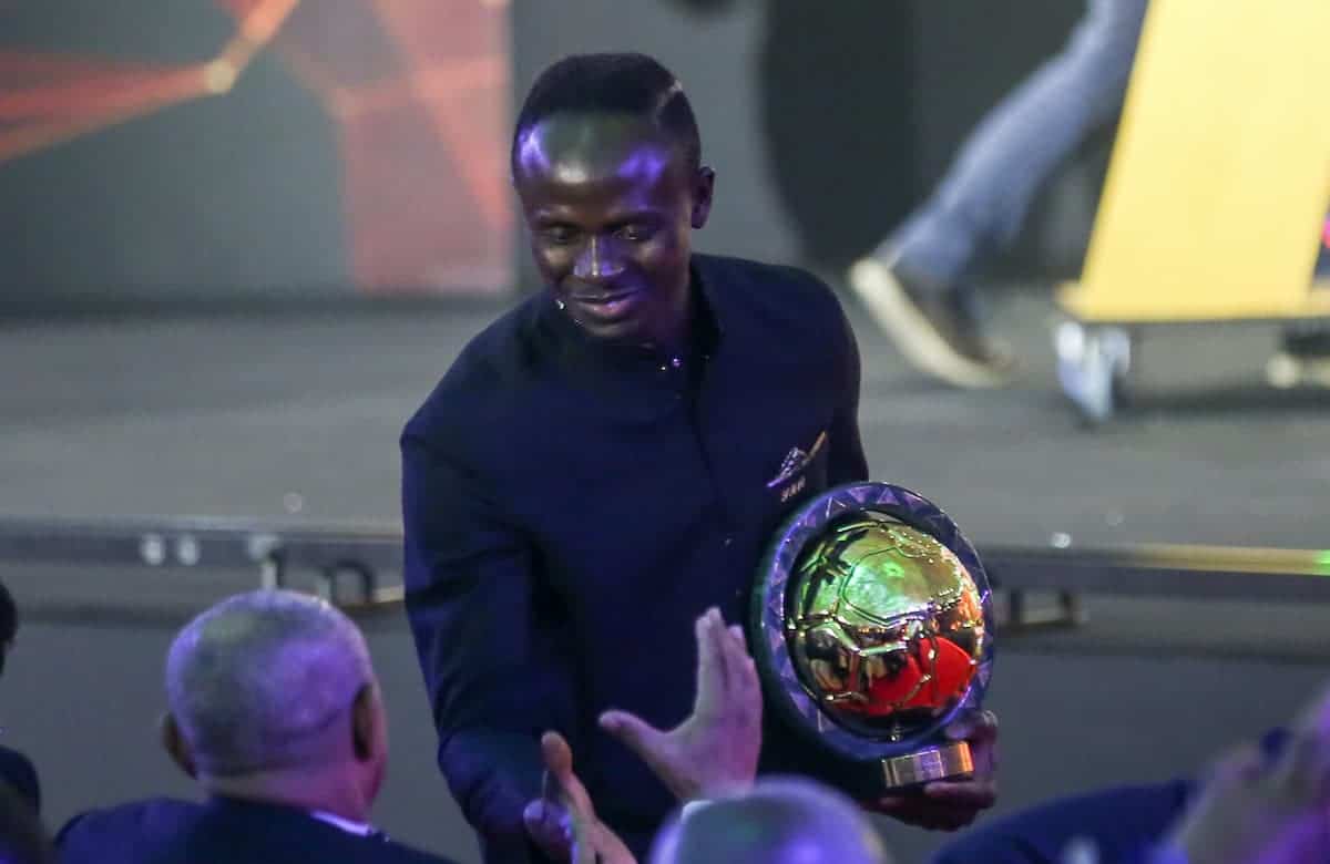 Sadio Mane, winner of the Player of the Year award, shakes hands with CAF†President Ahmad Ahmad during the 2019 CAF Awards ceremony at Albatros Citadel. Photo: Ibrahim Youssef/dpa