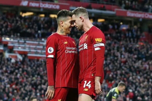 Jordan Henderson (r) of Liverpool celebrates with Roberto Firmino after scoring the second goal of the game during the Premier League match at Anfield, Liverpool. Picture date: 1st February 2020. Picture credit should read: James Wilson/Sportimage via PA Images