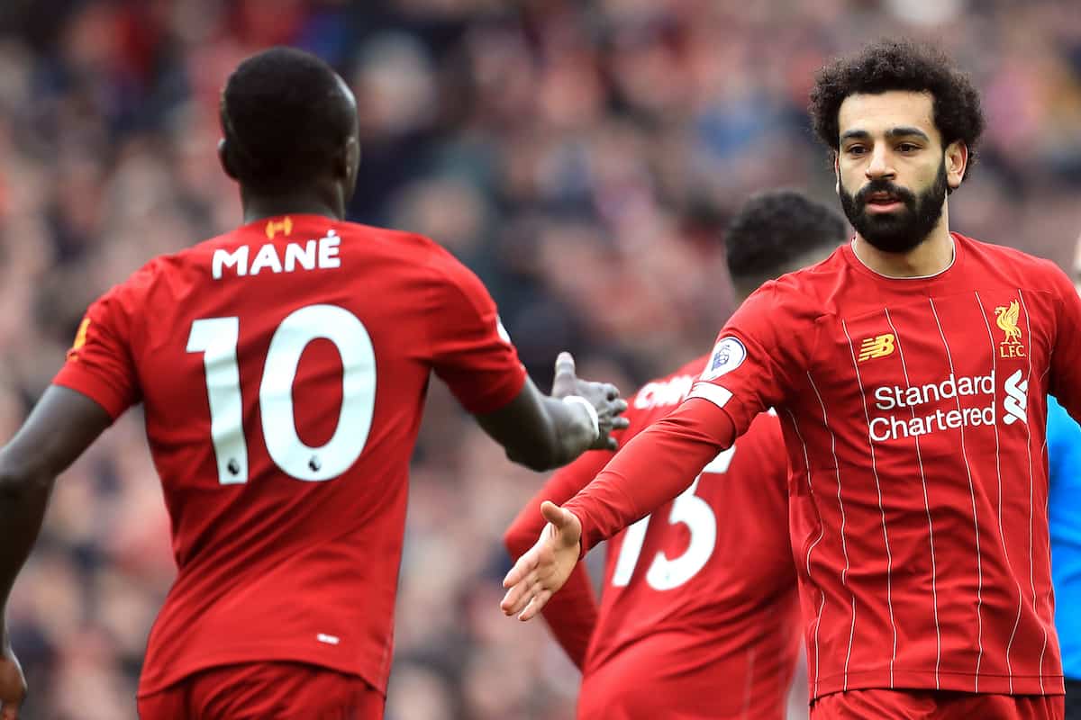 Salah and Mane celebrate. (Mike Egerton/PA Wire/PA Images)