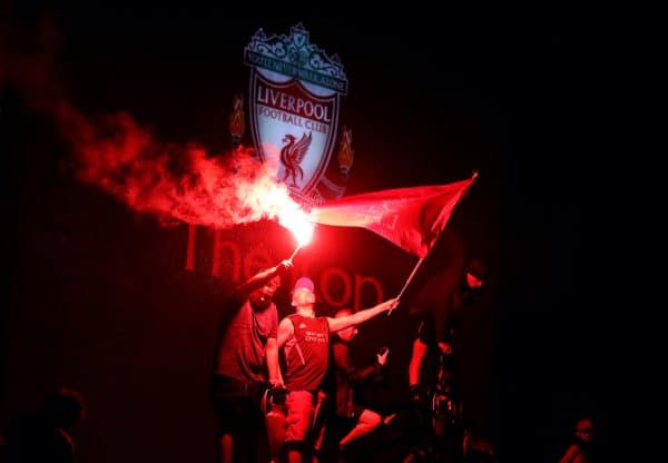 Liverpool fans let off flares outside Anfield, Liverpool. (Martin Rickett/PA Wire/PA Images)