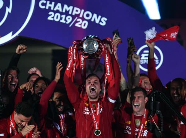 Liverpool captain Jordan Henderson lifts the Premier League Trophy following the Premier League match at Anfield, Liverpool. (Paul Ellis/PA Wire/PA Images)