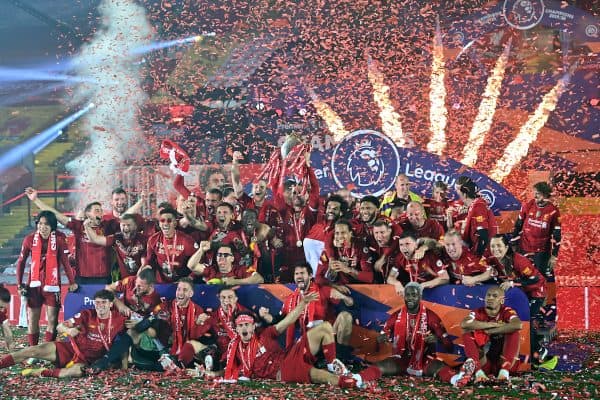 Liverpool players with the Premier League Trophy following the Premier League match at Anfield, Liverpool. ( Paul Ellis/PA Wire/PA Images)