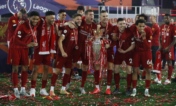 Liverpool celebrate with the Premier League trophy after the Premier League match at Anfield, ( Phil Noble/PA Wire/PA Images)