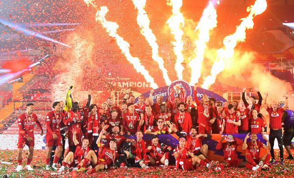 Liverpool players celebrate with the Premier League trophy after the Premier League match at Anfield, Liverpool. (Laurence Griffiths/PA Wire/PA Images)