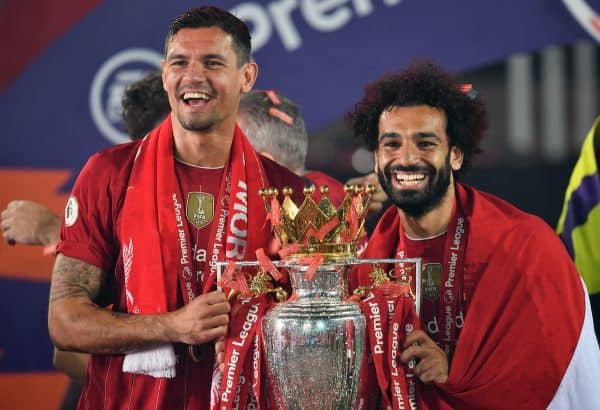 Liverpool's Dejan Lovren and Mohamed Salah lift the Premier League Trophy at Anfield. PA Photo. ( Paul Ellis/PA Wire/PA Images)