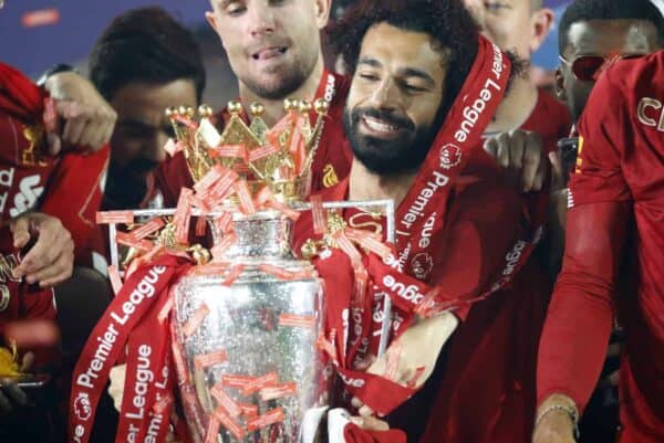 Liverpool's Mohamed Salah celebrates with the Premier League trophy after the Premier League match at Anfield, Liverpool. PA Photo. ( Phil Noble/PA Wire/PA Images)