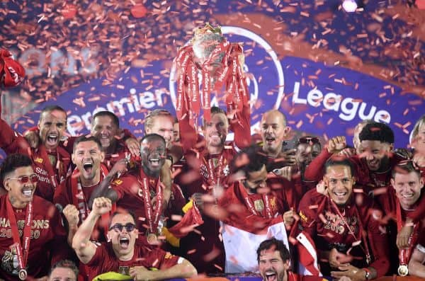 Liverpool's Jordan Henderson lifts the English Premier League trophy during the Premier League match at Anfield, Liverpool. (PA-54697236)