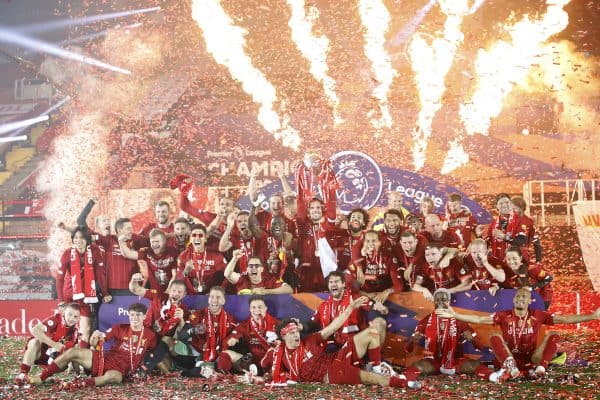 Liverpool players celebrate with the Premier League trophy after the Premier League (Phil Noble/PA Wire/PA Images)