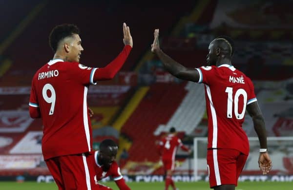 Liverpool's Sadio Mane celebrates scoring his side's first goal of the game with Roberto Firmino (left) during the Premier League match at Anfield, Liverpool. (Jason Cairnduff/PA Wire/PA Images)