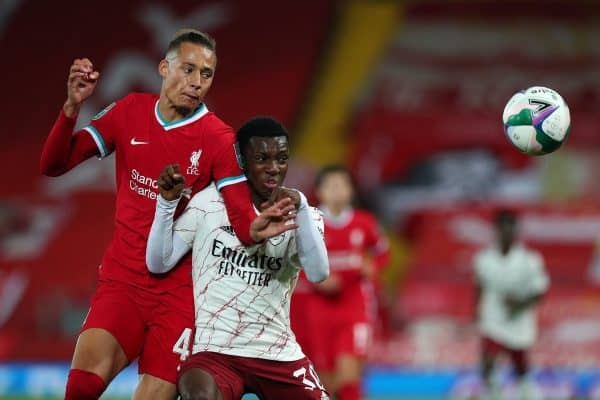 Liverpool's Rhys Williams (left) and Arsenal's Eddie Nketiah battle for the ball during the Carabao Cup fourth round match at Anfield, Liverpool.