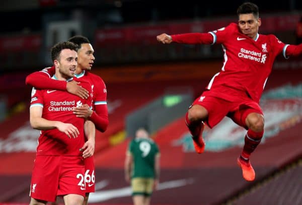 Liverpool's Diogo Jota celebrates scoring his side's second goal of the game with Trent Alexander-Arnold (second right) and Roberto Firmino (right) during the Premier League match at Anfield, Liverpool. (Image: Peter Byrne/PA Wire/PA Images)