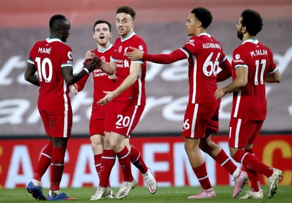 Liverpool's Diogo Jota (centre) celebrates scoring his side's second goal of the game with his teammates during the Premier League match at Anfield, Liverpool.