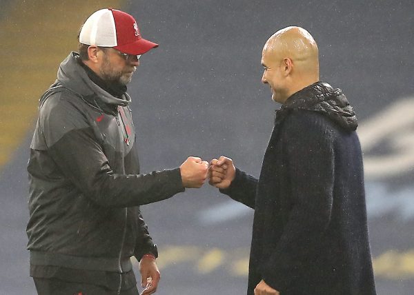 Liverpool manager Jurgen Klopp (left) and Manchester City manager Pep Guardiola after the final whistle during the Premier League match at the Etihad Stadium, Manchester. (Martin Rickett/PA Wire/PA Images)