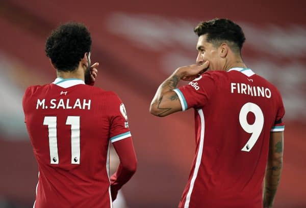 Liverpool's Mohamed Salah celebrates scoring with Liverpool's Roberto Firmino during the Premier League match at Anfield, Liverpool. (Peter Powell/PA Wire/PA Images)