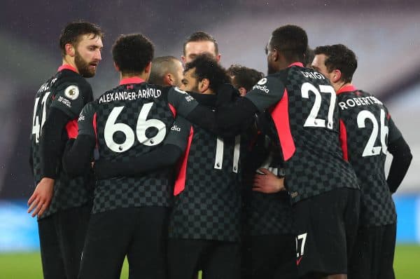 Liverpool's Mohamed Salah (centre) and team-mates celebrate their first goal during the Premier League match at the London Stadium, London. Picture date: Sunday January 31, 2021. Clive Rose/PA Wire/PA Images