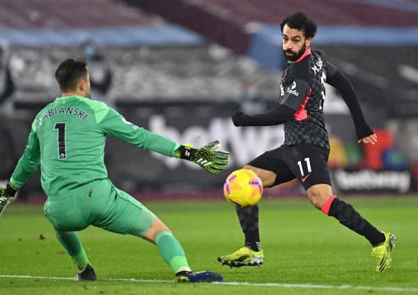 Liverpool's Mohamed Salah (right) scores their side's second goal of the game during the Premier League match at the London Stadium, London. Picture date: Sunday January 31, 2021. Justin Setterfield/PA Wire/PA Images