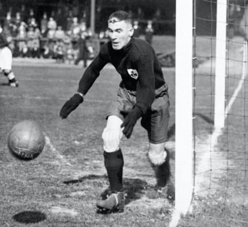 Liverpool goalkeeper Elisha Scott, playing for Northern Ireland, 1933