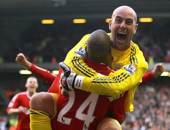 Liverpool's David Ngog (centre) celebrates scoring his sides second goal of the game with goalkeeper Jose Reina (right) (PA Image)