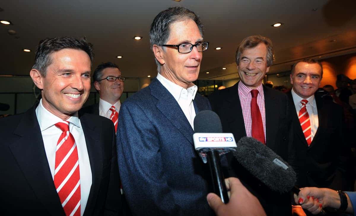 Liverpool FC new owner John W Henry (centre) of NESV with Liverpool chairman Martin Broughton (2nd right) and the club's managing director Christian Purslow (left) at the offices of Slaughter and May in the City of London today.