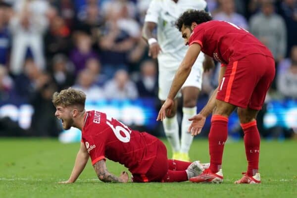 Liverpool's Harvey Elliott calls out in pain as team-mate Mohamed Salah checks on his condition after picking up a bad injury following a challenge by Leeds United's Pascal Struijk during the Premier League match at Elland Road, Leeds. Picture date: Sunday September 12, 2021.