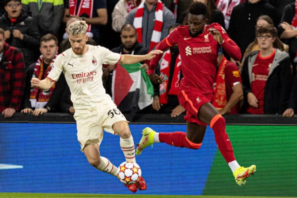 LIVERPOOL, ENGLAND - Wednesday, September 15, 2021: AC Milan's Alexis Saelemaekers and Liverpool's Divock Origi during the UEFA Champions League Group B Matchday 1 game between Liverpool FC and AC Milan at Anfield. (Pic by Paul Currie/Propaganda)