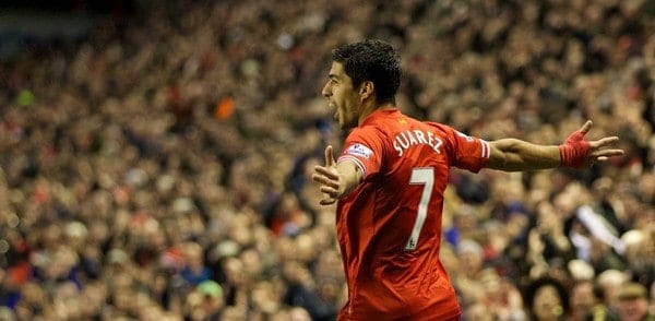LIVERPOOL, ENGLAND - Wednesday, January 1, 2014: Liverpool's Luis Suarez celebrates scoring the second goal against Hull City during the Premiership match at Anfield. (Pic by David Rawcliffe/Propaganda)