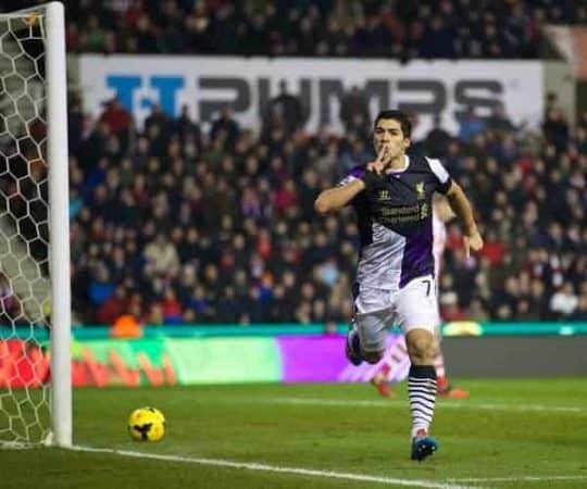 STOKE-ON-TRENT, ENGLAND - Sunday, January 12, 2014: Liverpool's Luis Suarez celebrates scoring the second goal against Stoke City during the Premiership match at the Britannia Stadium. (Pic by David Rawcliffe/Propaganda)