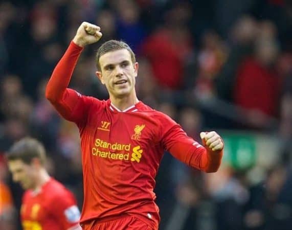 LIVERPOOL, ENGLAND - Sunday, February 23, 2014: Liverpool's Jordan Henderson celebrates after beating Swansea City 4-3 during the Premiership match at Anfield. (Pic by David Rawcliffe/Propaganda)