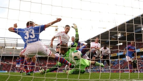 OSLO, NORWAY - Wednesday, August 7, 2013: Liverpool's Martin Kelly (2nd right) scores the third goal against Valerenga during a preseason friendly match at the Ullevaal Stadion. (Pic by David Rawcliffe/Propaganda)