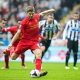 NEWCASTLE-UPON-TYNE, ENGLAND - Saturday, October 19, 2013: Liverpool's captain Steven Gerrard scores the first goal against Newcastle United from the penalty spot during the Premiership match at St. James' Park. (Pic by David Rawcliffe/Propaganda)