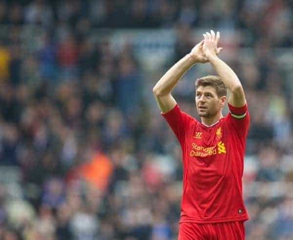 NEWCASTLE-UPON-TYNE, ENGLAND - Saturday, October 19, 2013: Liverpool's captain Steven Gerrard applauds the travelling supporters after his sides' 2-2 draw with Newcastle United during the Premiership match at St. James' Park. (Pic by David Rawcliffe/Propaganda)