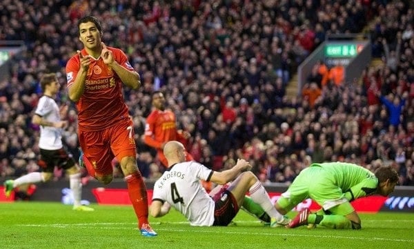 LIVERPOOL, ENGLAND - Saturday, November 9, 2013: Liverpool's Luis Suarez celebrates scoring the fourth goal against Fulham, his hat-trick third goal, during the Premiership match at Anfield. (Pic by David Rawcliffe/Propaganda)